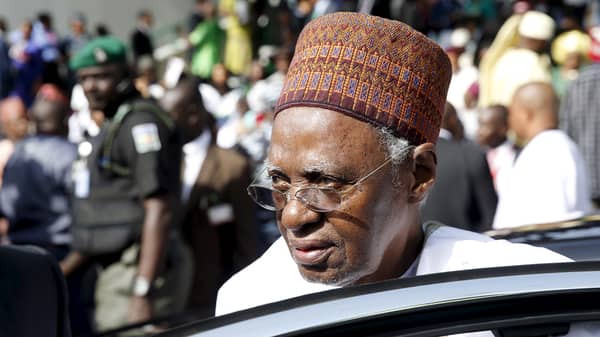 Former Nigerian presdent Shehu Shagari arrives for the inauguration ceremony of Nigeria’s President Muhammadu Buhari in Abuja