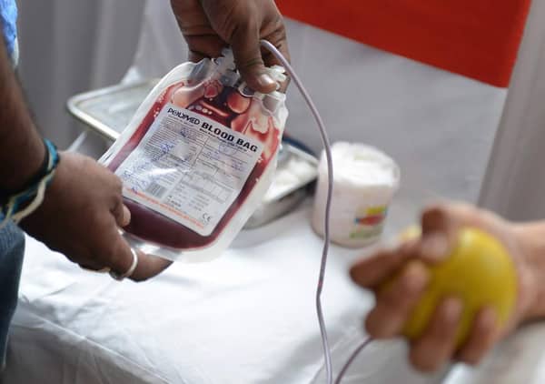 A person donating blood