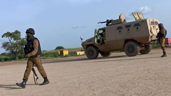 Soldiers guard positions near the Naaba Koom military base in Ouagadougou