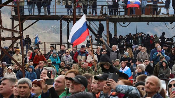 People attend a celebratory event marking the fifth anniversary of Russia’s annexation of Crimea in Sevastopol