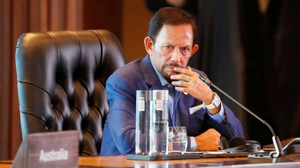 FILE PHOTO: Brunei’s Sultan Hassanal Bolkiah attends the retreat session during the APEC Summit in Port Moresby, Papua New Guinea