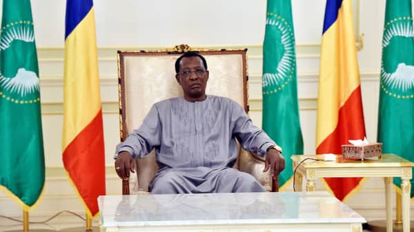 Chad’s President Idriss Deby Itno sits in an armchair at the presidential palace prior to his meeting with French Prime Minister in N’Djamena
