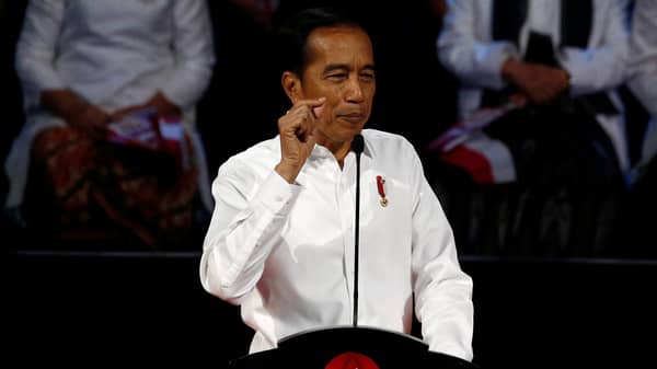 Indonesia’s incumbent president Joko Widodo, who was re-elected on April’s election gestures as he delivers a speech to highlight his vision for the next five years in Bogor