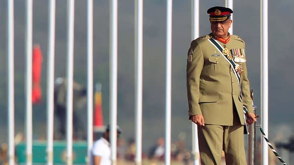 Pakistan’s Army Chief of Staff Lieutenant General Qamar Javed Bajwa arrives to attend the Pakistan Day military parade in Islamabad