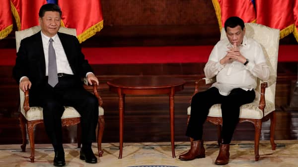 FILE PHOTO: China’s President Xi Jinping and Philippine President Rodrigo Duterte meet during an Exchange of Agreements at the Malacanang presidential palace in Manila
