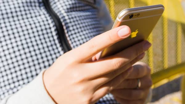 adult-apple-cellular-phone-272931