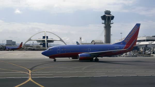 A Southwest Airlines plane taxies at Los Angeles International Airport (LAX) in Los Angeles California