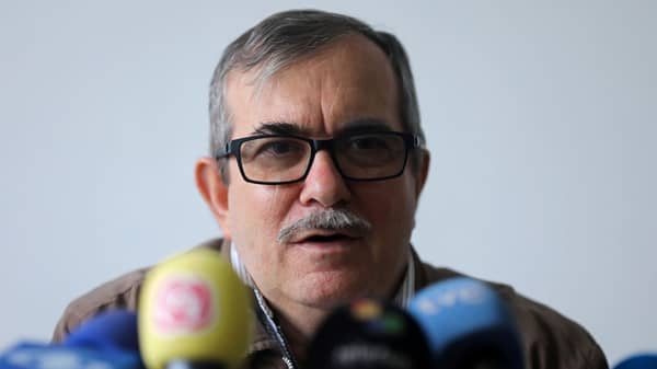 Rodrigo Londono, known by his nom de guerre Timochenko, speaks during a news conference at Special Jurisdiction for Peace (JEP) tribunal in Bogota