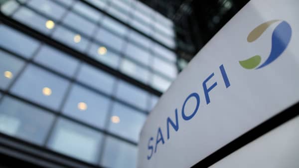A logo is seen in front of the entrance at the headquarters of French drugmaker Sanofi in Paris