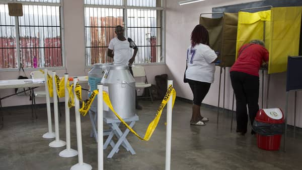 Suriname people voting for new parliament
