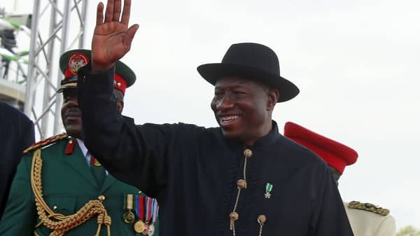 Nigeria’s outgoing President Goodluck Jonathan waves to people after the handover to incoming President Muhammadu Buhari at Eagle Square in Abuja