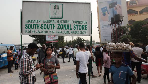 Election workers wait at the South-South Zonal Store of INEC at Port Harcourt in Rivers State, ahead of the country’s presidential election
