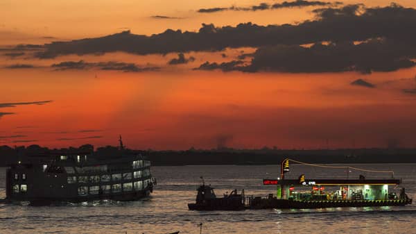 A floating Atem petrol station for small and medium vessels is seen in the middle of the Rio Negro river, near the Port of Panair in Manaus