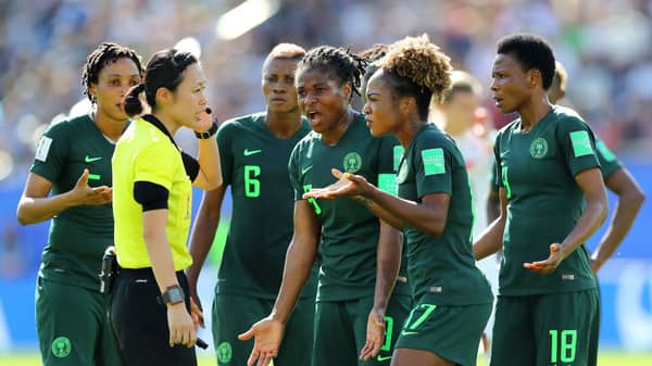 https _cdn.cnn.com_cnnnext_dam_assets_190623150208-nigeria-players-confront-referee-yoshimi-yamashita