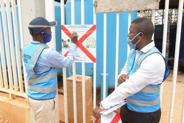 Officials of Lagos State Water Regulatory Commission (LSWRC) sealing Banana Island water plant