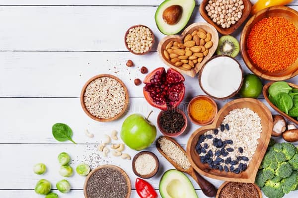 healthy-food-background-fruits-vegetables-cereal-nuts-superfood-dietary-balanced-vegetarian-eating-products-kitchen-143677456