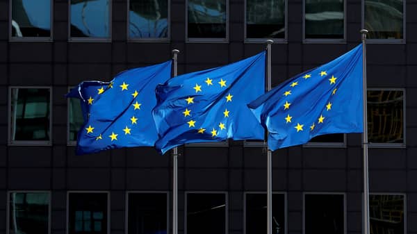 FILE PHOTO: European Union flags flutter outside the European Commission headquarters in Brussels, Belgium