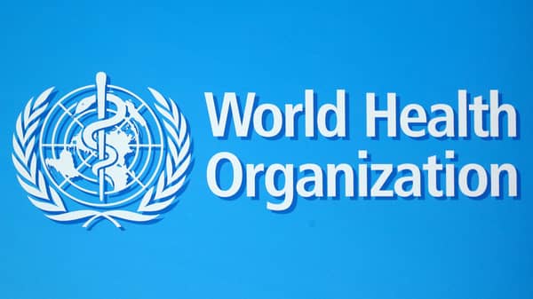 FILE PHOTO: A logo of the World Health Organization (WHO), is seen before a news conference in Geneva
