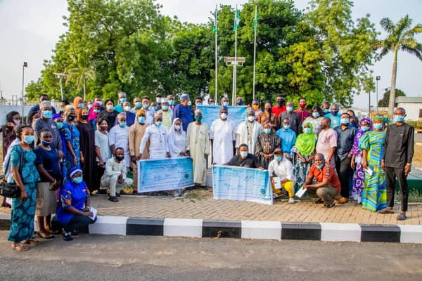Kwara State governor Abdulrahman Abdulrazaq presenting after presenting cheques to businesses affected by #EndSARS protest