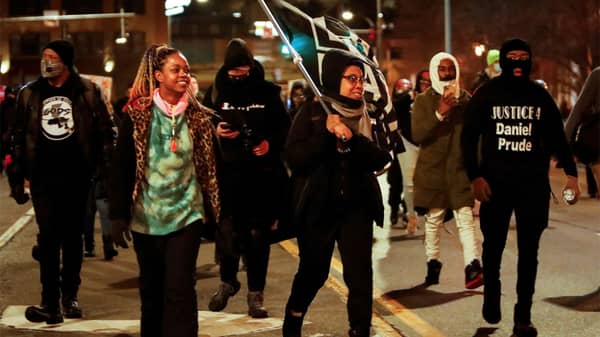 Protestors march after the New York grand jury votes not to indict officers in Prude’s death