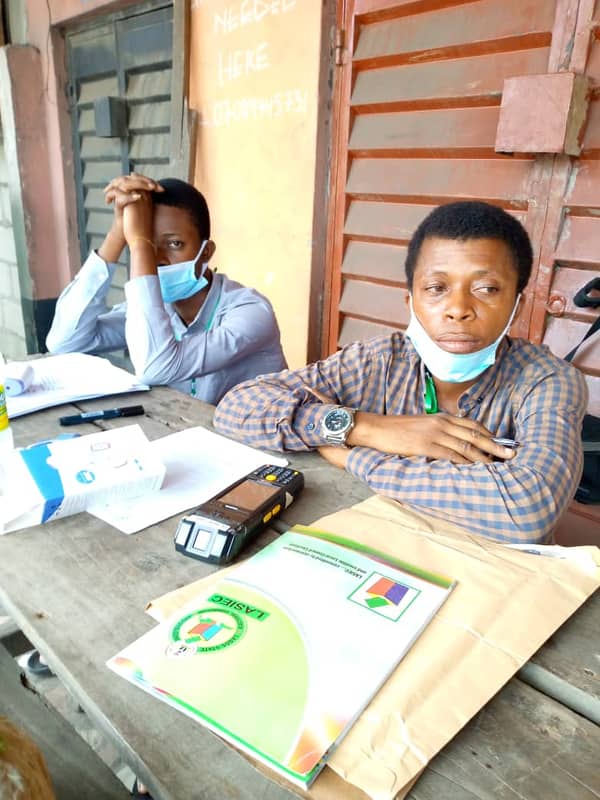 INEC official waiting for voters at progress road Abule Egba as at 10 am