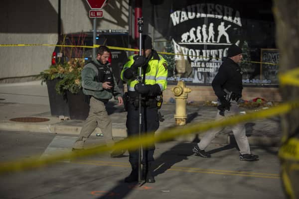 Car Drives Through Holiday Parade In Waukesha, Wisconsin
