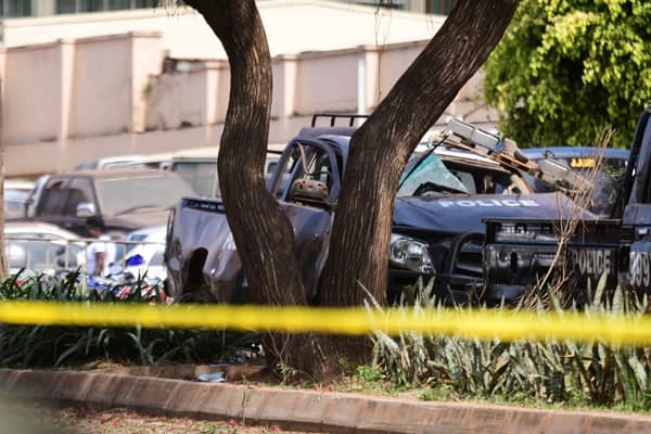 A general view shows wreckages of police vehicles at the scene of a blast in Kampala, Uganda November 16, 2021. REUTERS/Abubaker Lubowa