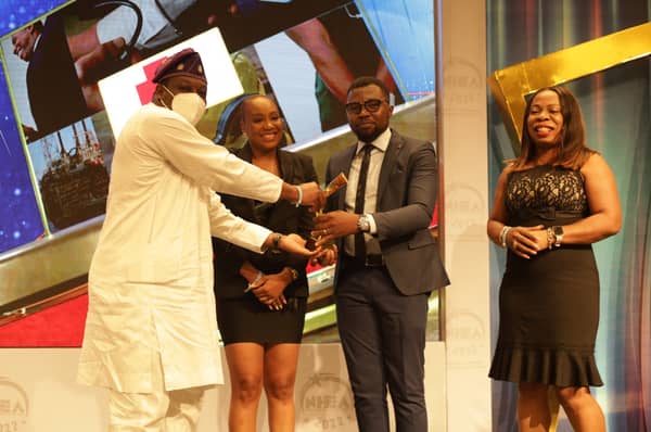 NCDC-DG-presenting-the-award-to-Medbury-Medicals