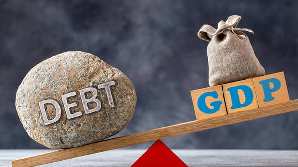 Debt-to-gdp,Ratio,,A,Large,Stone,With,Text,Debt,And,Wooden