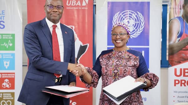 Chris-Ofikilu,-RCEO-UBA-West-Africa-and-MD-UBA-Ghana-in-a-photograph-with-Dr.-Angela-Lusigi,-UNDP-Resident-Representative-in-Ghana-exchanging-MoU-after-signing-ceremony-