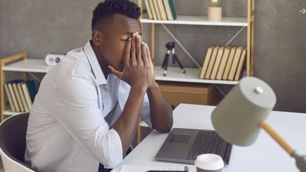 man-office-desk-tired-stressed-2
