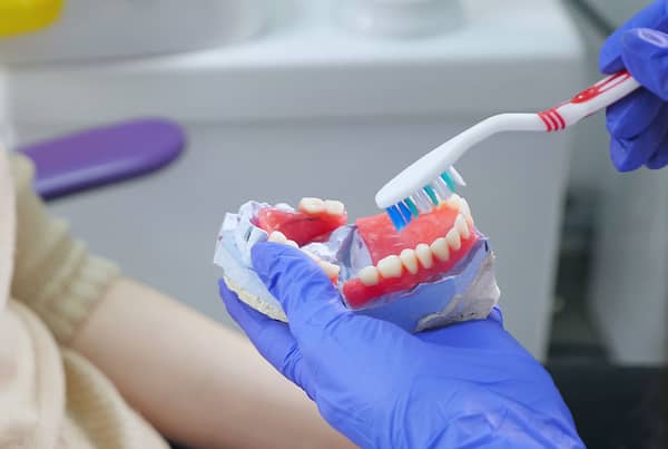 dental-jaw-blue-overlay-1200×628-iStock-1145063557