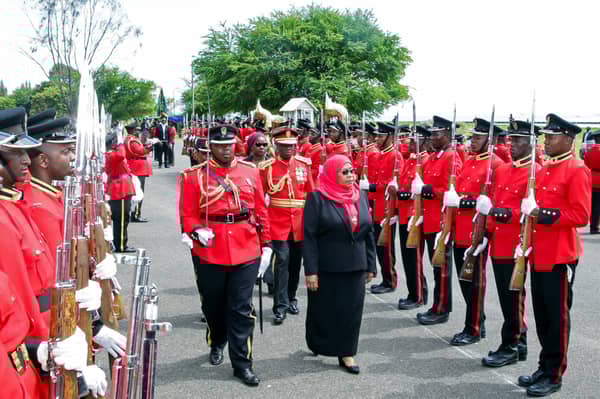 Tanzania’s new President Samia Suluhu Hassan inspects a guard of honour in Dar es Salaam