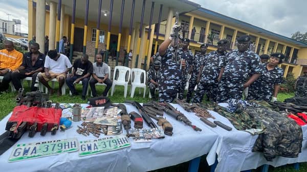 Suspects, recovered arms and ammunition
