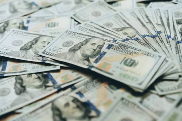 Dollar banknotes, $100 dollar bills, money background