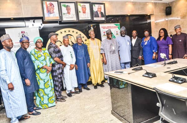 The Minister of Housing and Urban Development, Ahmed Dangiwa and the board of the Federal Mortgage Bank of Nigeria (FMBN)