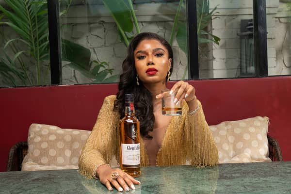 Nancy Isime toasts with Glenfiddich in style