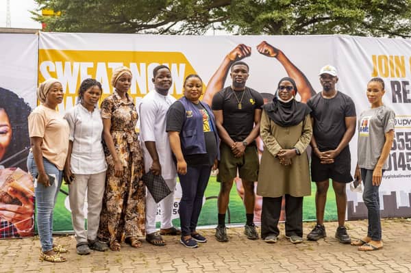Amb. Austine Oladejo with the Egbe- Idimu Health Centre Team and The Lead Fitness Trainer, Icon007