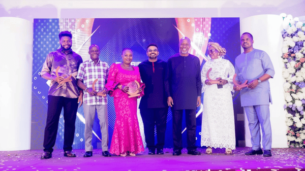 CEO of OmniRetail, Mr. Deepankar Rustagi (4th from left), and some of the awarded distributors of OmniPay during the OmniPay Distributors Gala Night and Awards held at Ikeja, Lagos