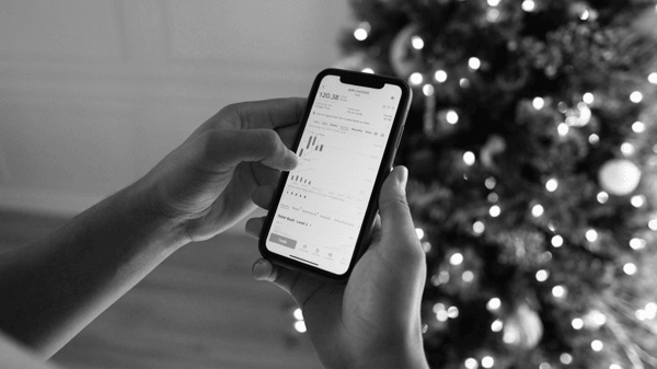 Nigerian trader using mobile devices to monitor forex markets