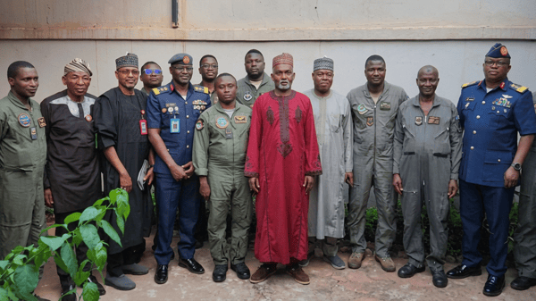 Nigeria’s Minister of Foreign Affairs, Yusuf Tuggar, with the 11 Nigerian Air Force personnel