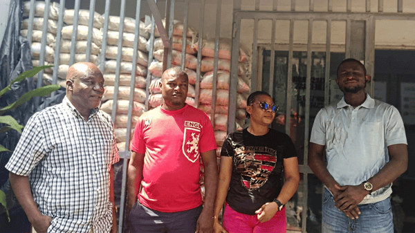 Officials of the firm with gift items