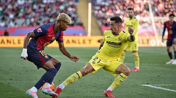 Barca’s Lamine Yamal disposess Villareal player in Sunday’s Laliga clash. PHOTO CREDIT httpswww.barcablaugranes.com