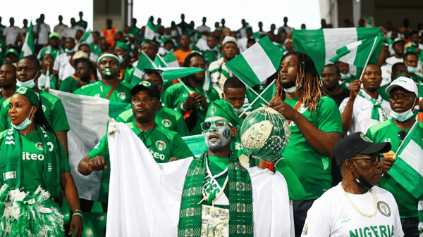 Super Eagles supporters Club members cheering the team in a Group A game against Equatorial Guinea