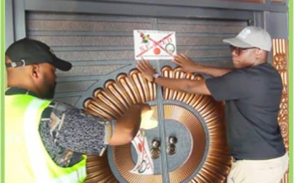 Dr Babatunde Ajayi ( right) with LASEPA official during noise pollution  enforcement.