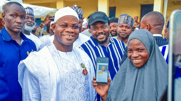 Yahaya Bello (in white) and APC members during the electronic registration exercise in Kogi State