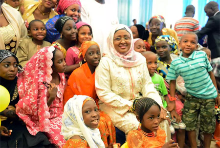 Aisha Buhari says she still cooks for the President, hosts FCT Children ...