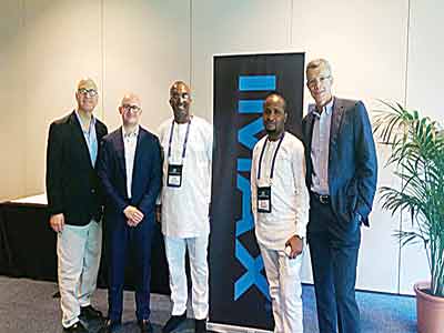 Managing Director of Film House Cinema and Film One Distribution company, Mr. Kene Mkparu and IMAX officials at the signing ceremony… in Lagos 