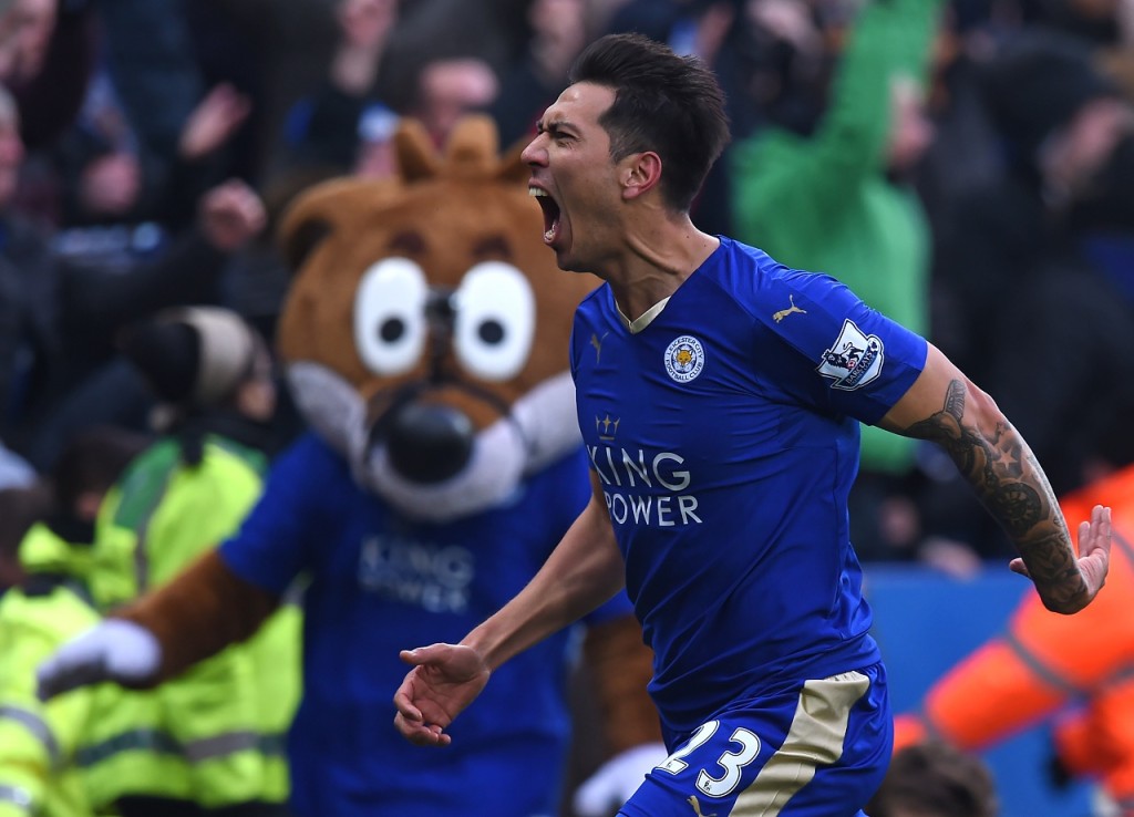 Leicester City's Argentinian striker Leonardo Ulloa celebrates scoring the opening goal of the English Premier League football match between Leicester City and Norwich City at King Power Stadium in Leicester, central England on February 27, 2016. Leicester won the game 1-0. / AFP / Paul ELLIS / RESTRICTED TO EDITORIAL USE. No use with unauthorized audio, video, data, fixture lists, club/league logos or 'live' services. Online in-match use limited to 75 images, no video emulation. No use in betting, games or single club/league/player publications. /