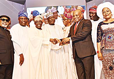 Minister of Labour and Productivity, Dr. Chris Ngige (left), Lagos State Governor, Mr. Akinwunmi Ambode, winner of The Sun Man of the Year, Asiwaju Bola Tinubu, Secretary to the Government of the Federation (SGF), Mr. Babachir David Lawal, National Chairman of the All Progressives Congress (APC), Chief John Oyegun, Publisher, The Sun Newspapers, Dr. Orji Uzor Kalu, former Deputy Governor of Lagos State, Otunba Femi Redro and Deputy Governor of Osun State, Mrs. Titilayo Laoye-Tomori, during the Sun Awards in Lagos…at the weekend